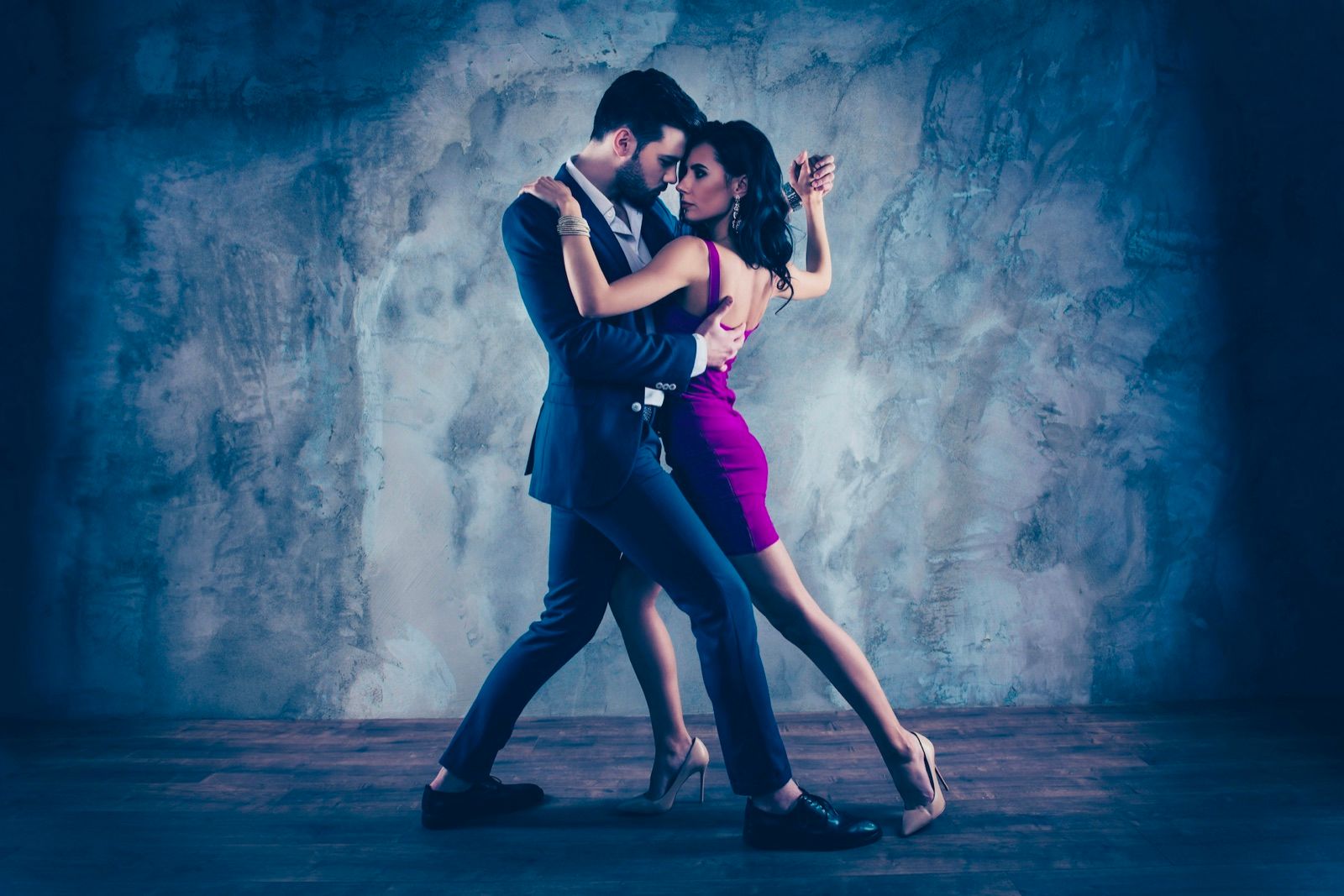 A couple dancing together at the Salsa Dance LA studio in Los Angeles